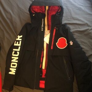 Moncler Black Coat with Red Accents
